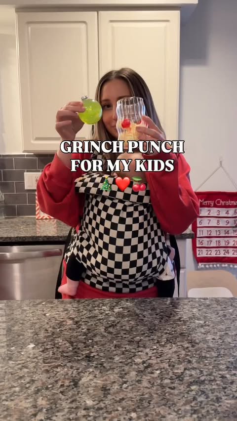 Instagram post by @hellolaurenashley for Hawaiian Tropic. Caption reads: Grinch punch for my kids!  We made this fun grinch....