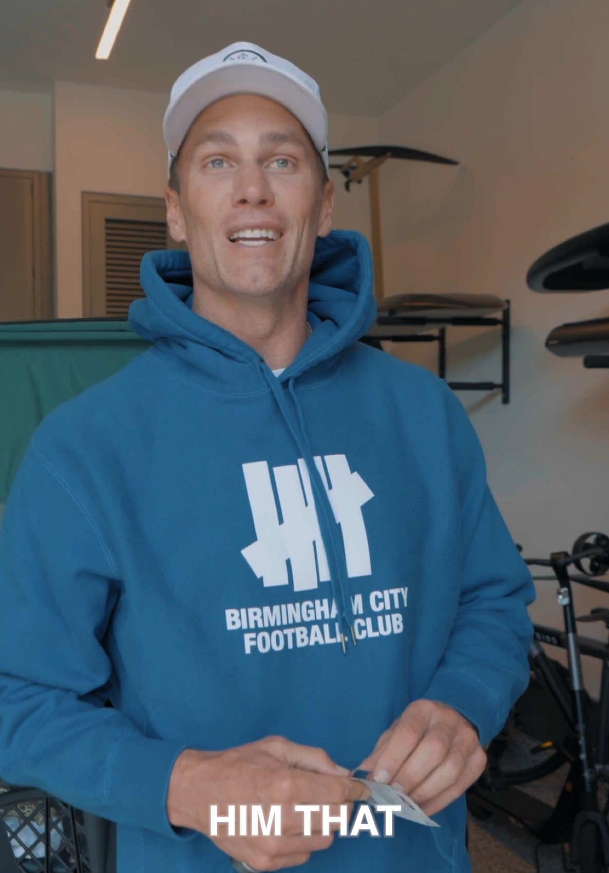 TikTok post by @tombrady for Duracell. Caption reads: 1v1 with my guy Carlos Sainz! Thanks for setting....