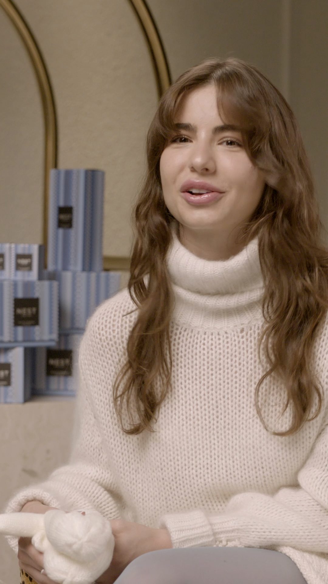 Instagram post by @violetta for NEST New York. Caption reads: [...] and city magic to the holidays with NEST NEW....