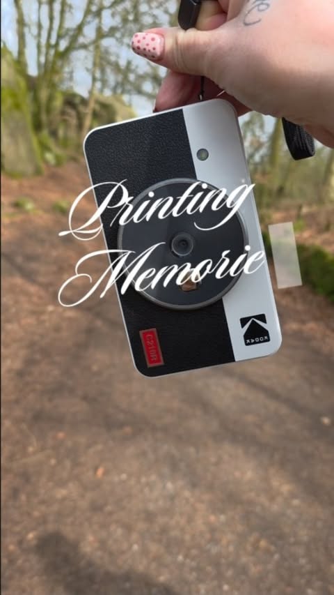 Instagram post by @rebeccaedwardsxx for Kodak Photo Printer. Caption reads: [...] memories feel a bit more real 💕....