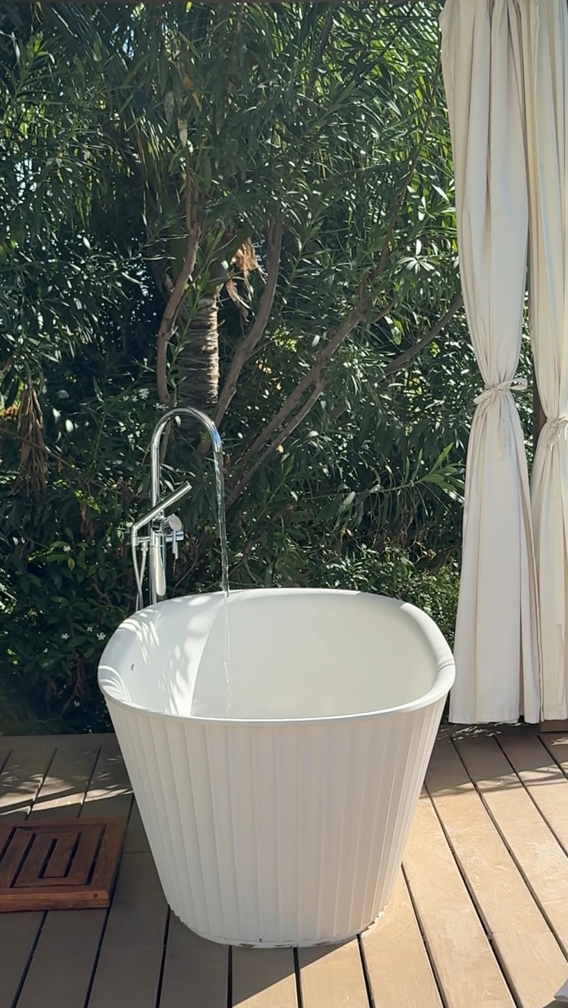 Instagram post by @itsyuyann for Sandals Resorts. Caption reads: Slow living in the Caribbean only. We had the best....