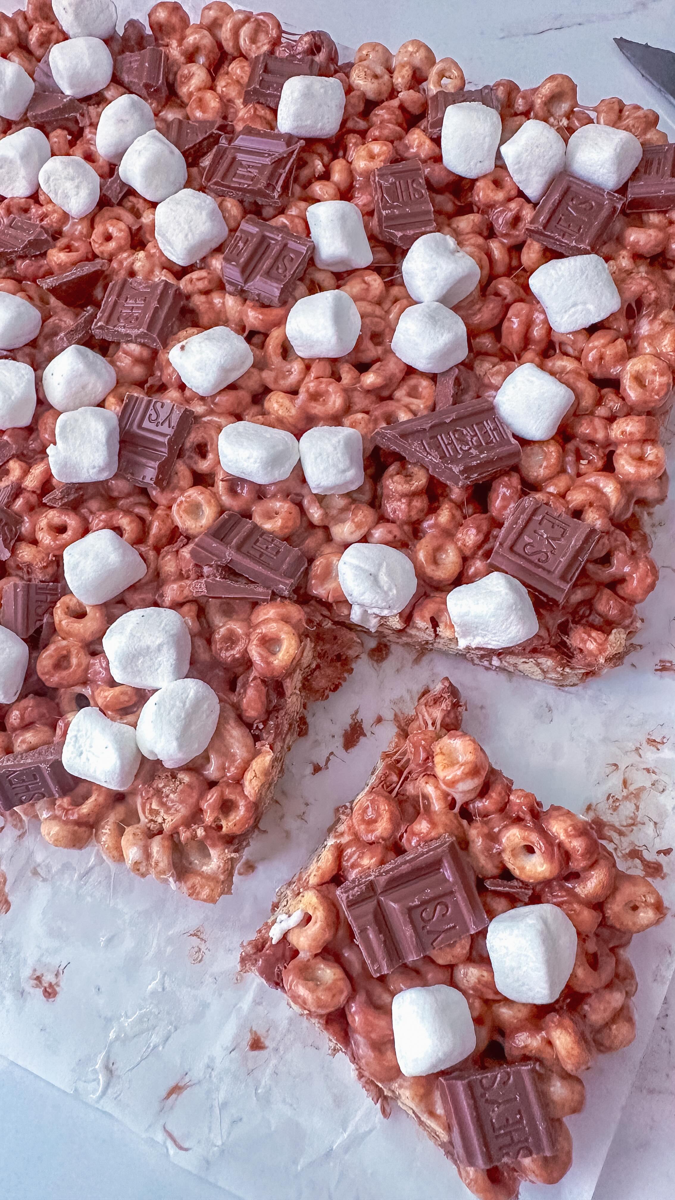 Instagram post by @charcuterie_n_things for Reynolds Brands. Caption reads: S’mores Protein Bars 🍫🔥

My friends at....