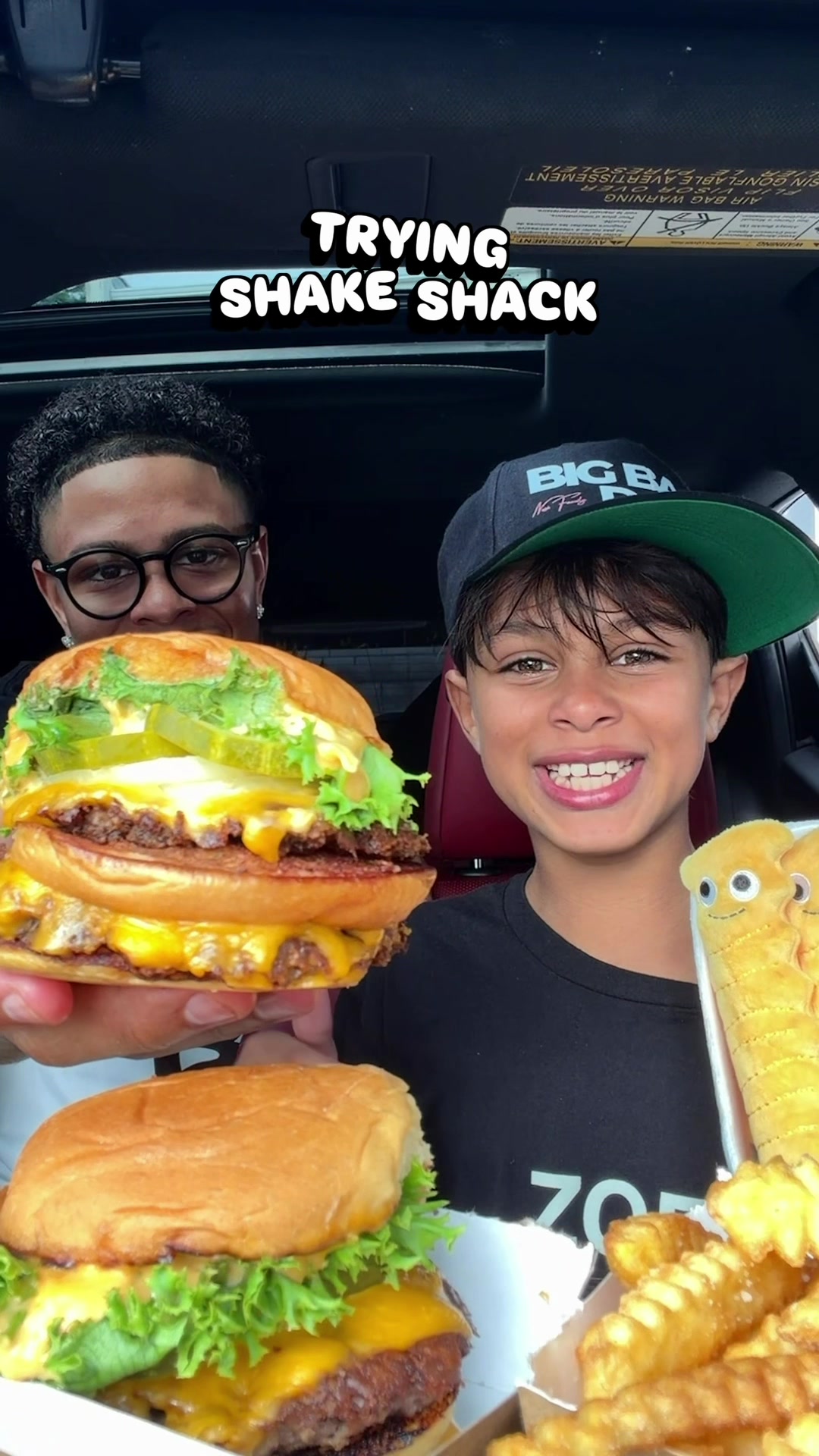 TikTok post by @nesimento_ for Shake Shack. Caption reads: Trying The Big Shack from @SHAKE SHACK with my Big....