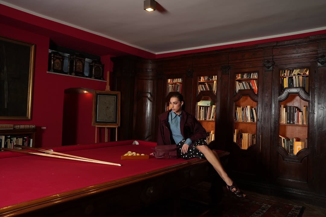 Instagram post by an influencer for Fendi. Caption reads: pool & dots 🎱 // @fendi SS26 @Fendi #FendiHoliday....