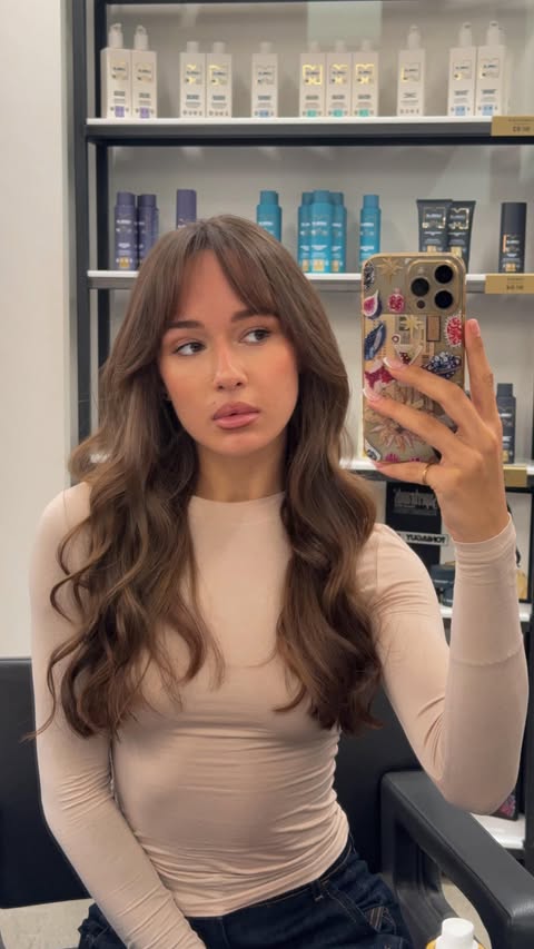 Instagram post by @klaudia.milcz for BaByliss. Caption reads: @babyliss I’m obsessed 🛸 #ad....