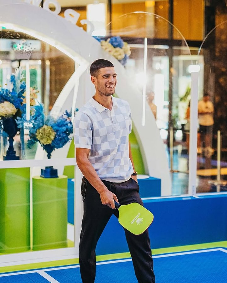 Instagram post by @carlitosalcarazz for Crown Hotels. Caption reads: [...] down to the @australianopen! 🔥 @crownhotels.