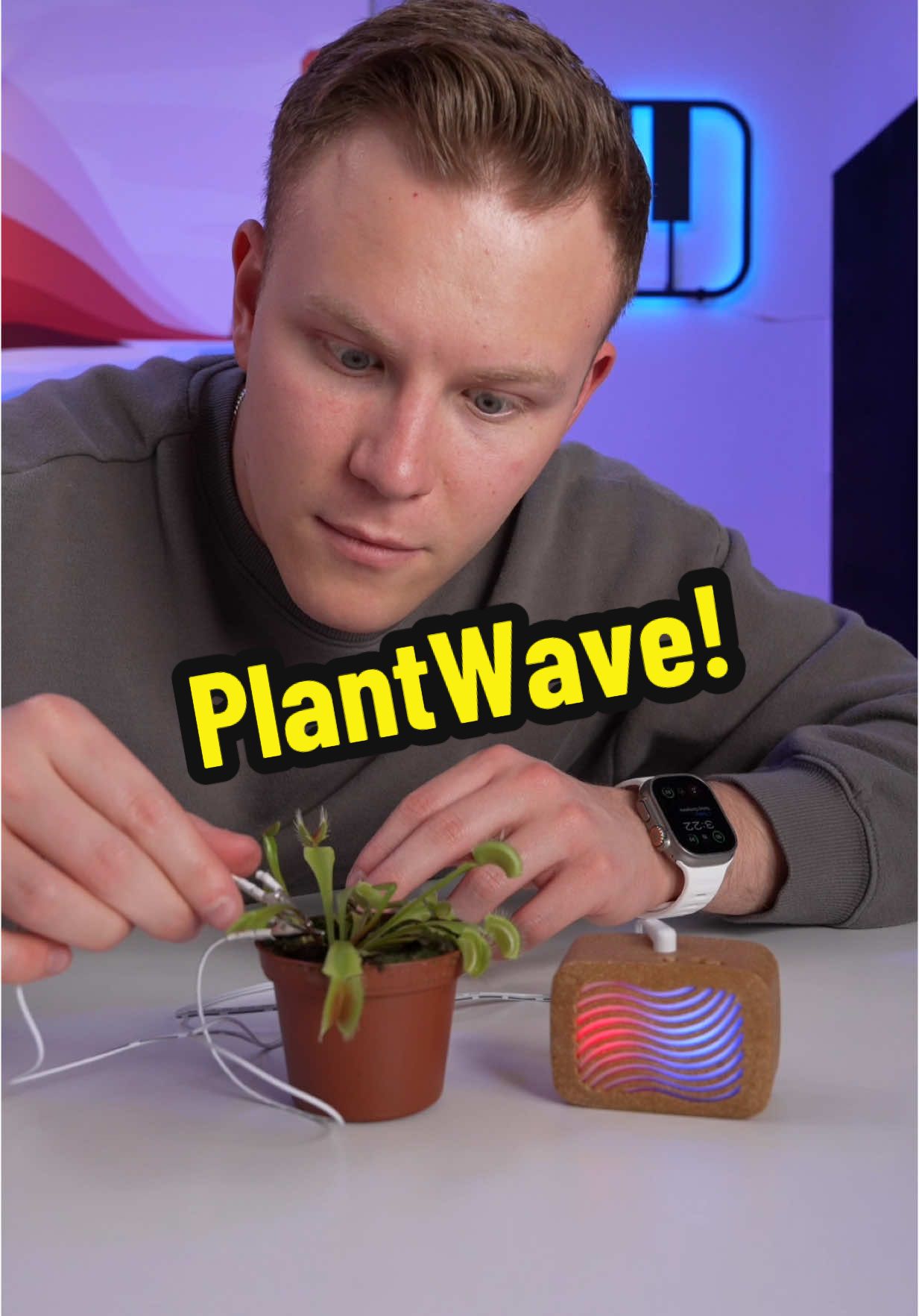 TikTok post by @landenpurifoy for PlantWave. Caption reads: @PlantWave lets plants sing. Tune into nature and....