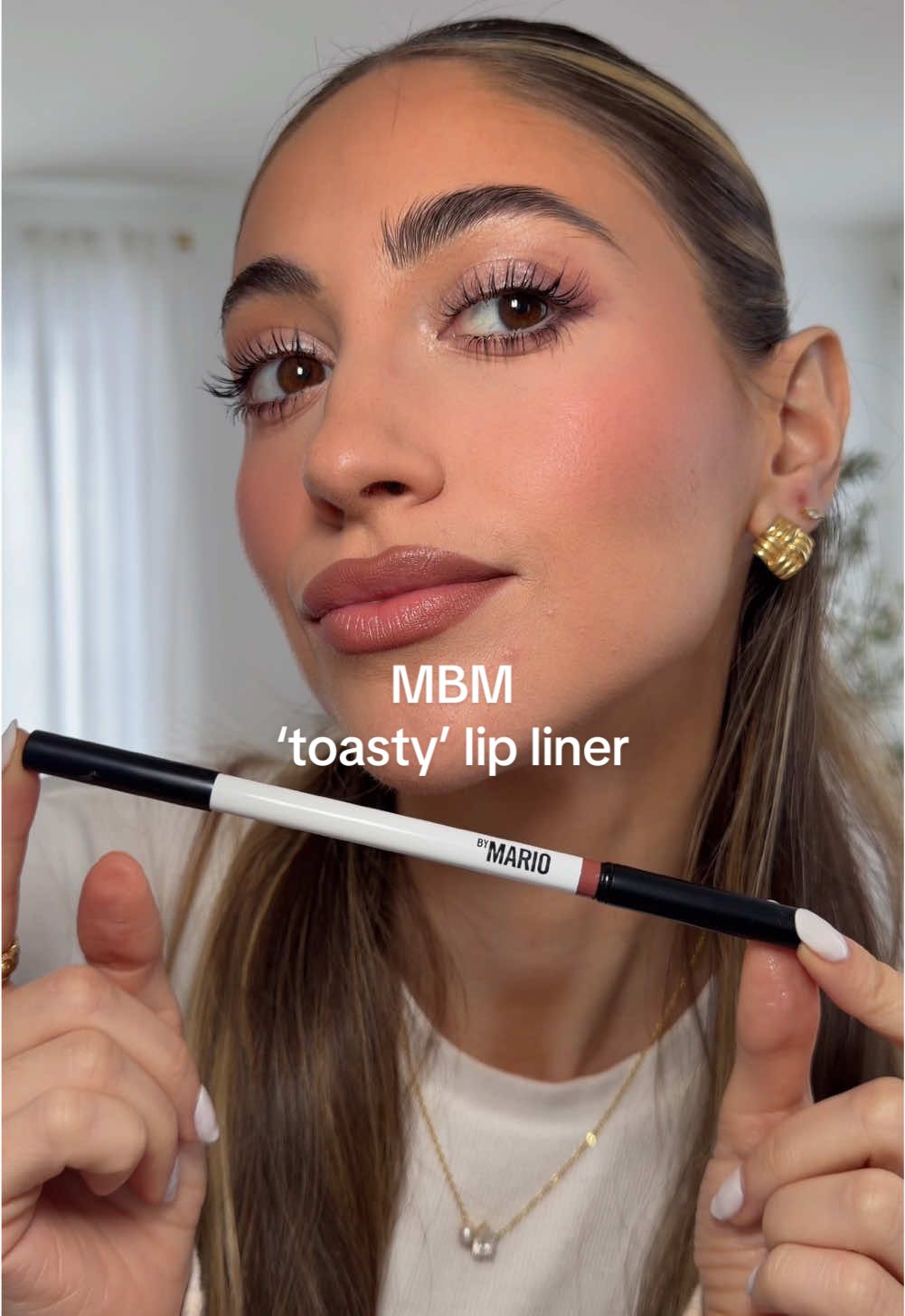 TikTok post by @samanthaa.nicole for MAKEUP BY MARIO. Caption reads: could this be the most perfect lip liner shade?!....