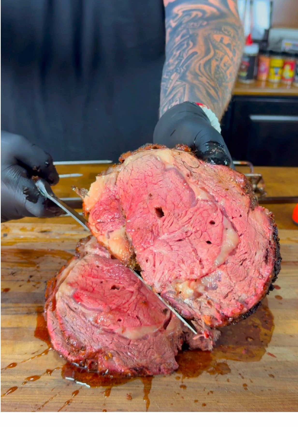 TikTok post by @cooking.with.cj for SNS Grills. Caption reads: [...]  🔥🔥🔥 Kettle and rotisserie - @SNS Grills ....