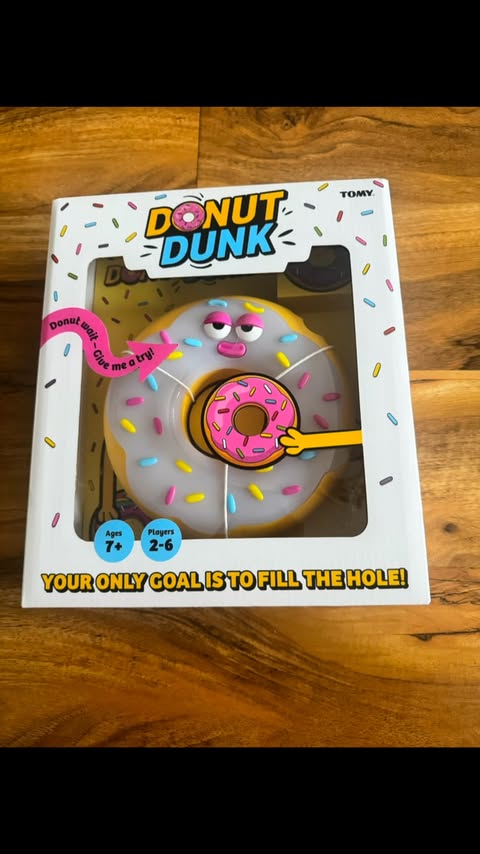 Instagram post by @bambio19 for TOMY. Caption reads: [...] @smythstoys #donutdunktrial @gamesbytomy....