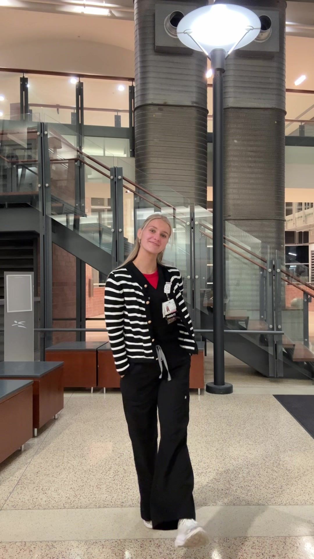 TikTok post by @kamifleming for FIGS. Caption reads: [...] day with a cute outfit 🤓 @wearfigs....