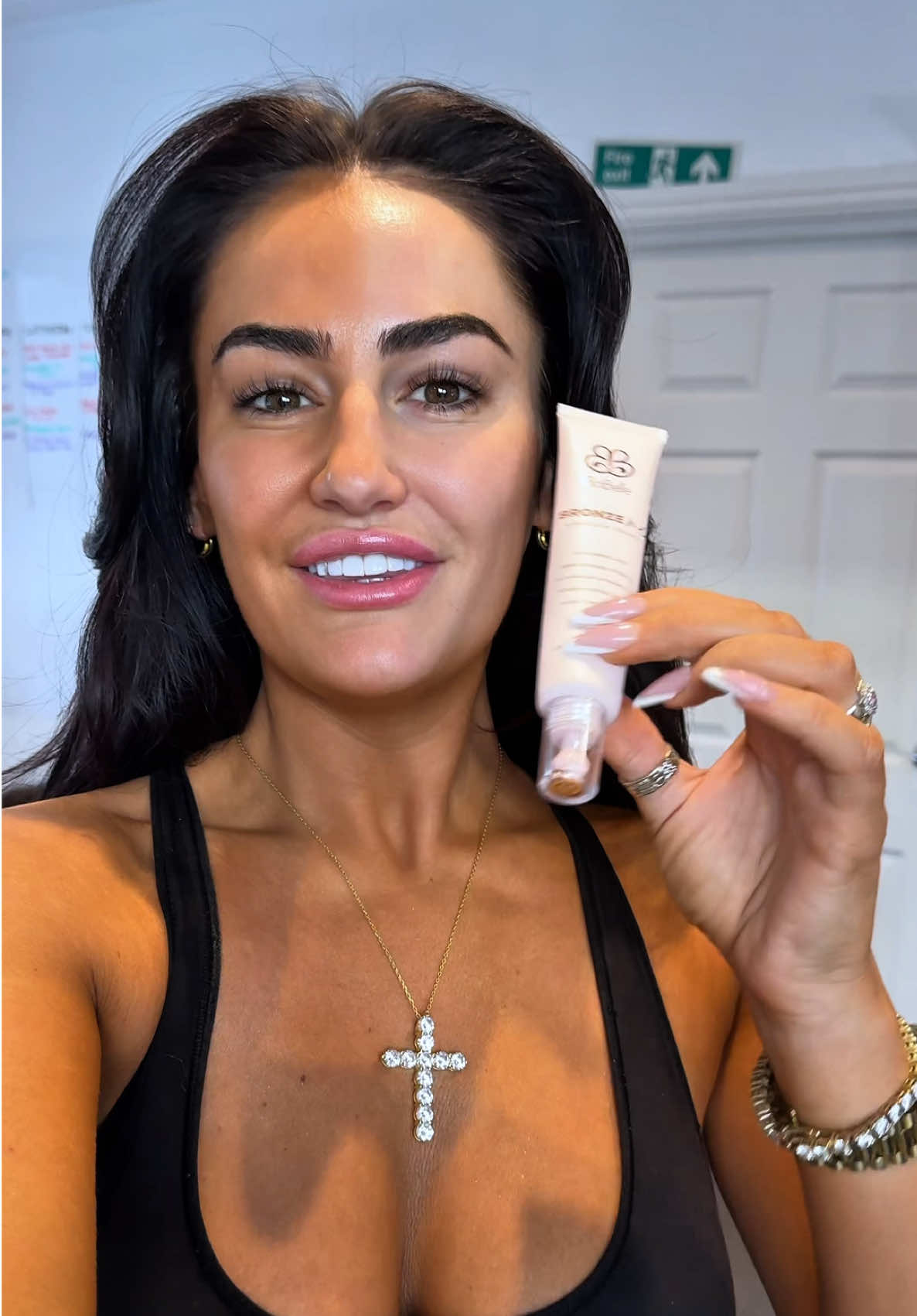 TikTok post by @blamurphy for BiaBelle Beauty. Caption reads: The Viral @BiaBelle Bronze Me Airbrush Drops 💧....