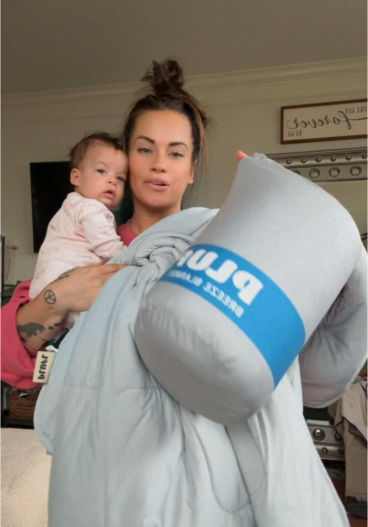 TikTok post by @growingwithkelsey for Plufl. Caption reads: [...] #tiktokshopbedding #coolingblanket #plufl....
