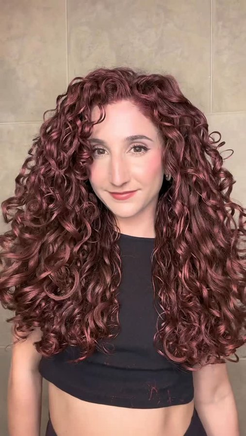 Instagram post by @laurenpiluso for CURLSMITH. Caption reads: Potion applied 🔮🐈‍⬛ transformation....