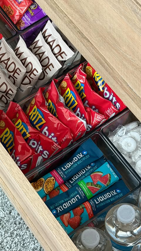 Instagram post by @kate_cleanhome for Chomps. Caption reads: [...] my secret snack drawer🤭🍪🍫🥤 @chomps....