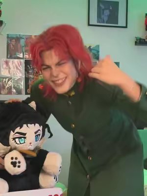 TikTok post by @noctsuki_cos for PlushShop. Caption reads: Luckily @PLUSHSHOP.COM send me this Jotaro Meow to....
