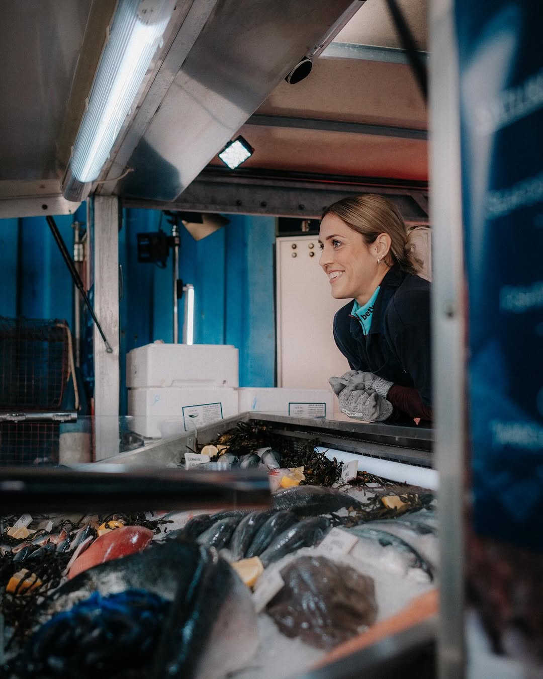 Instagram post by @katrinagorry10 for Intuit QuickBooks. Caption reads: Our skipper scaling up at the fishmongers 🐟 
....