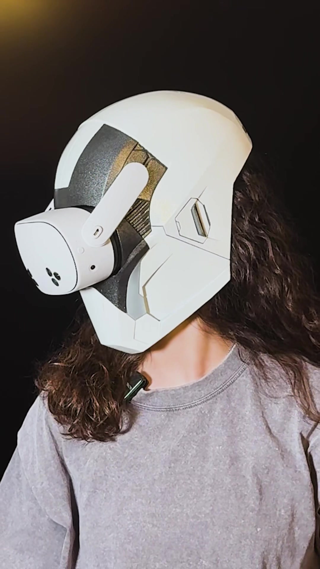 TikTok post by @emily.the.engineer for Meta Quest. Caption reads: #ad I shoved a @Meta Quest into a helmet inspired....