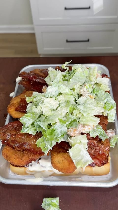 Instagram post by @g_bque for KING'S HAWAIIAN. Caption reads: Chicken Caesar Sliders with @kingshawaiian....