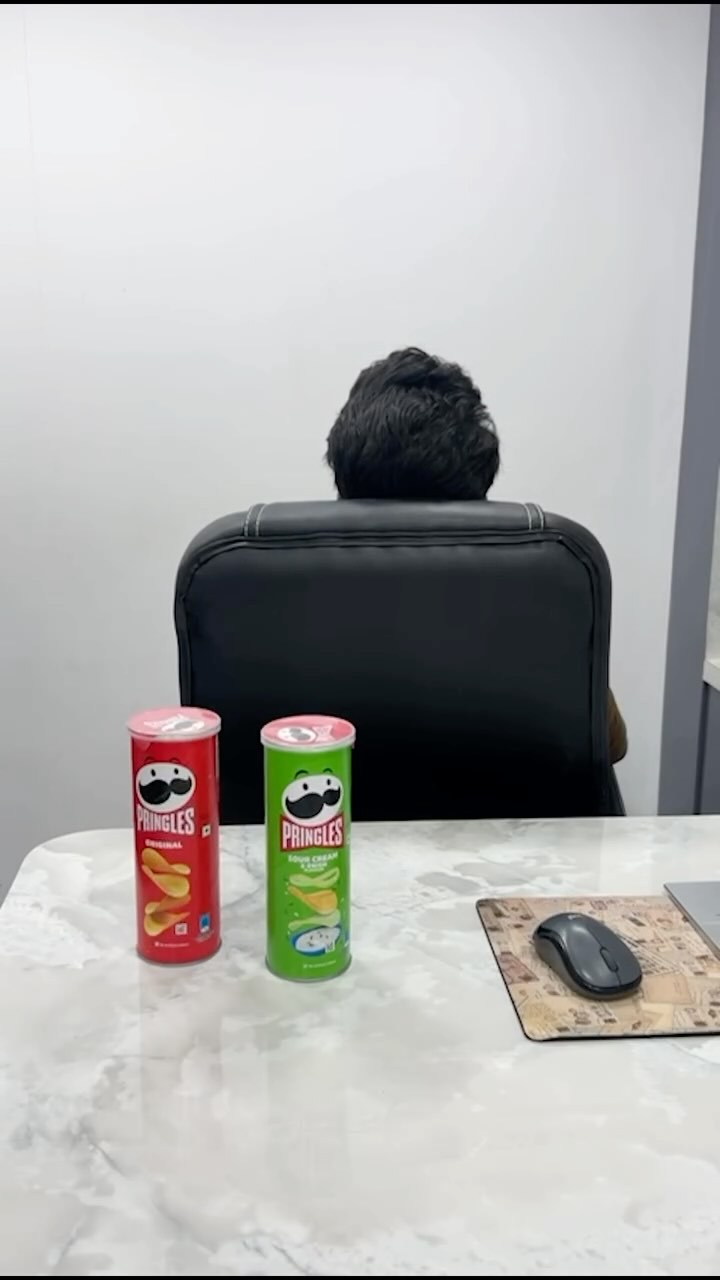 Instagram post by @traveller.atom for Pringles. Caption reads: Calling all selfie pros! 📸Here’s the challenge....