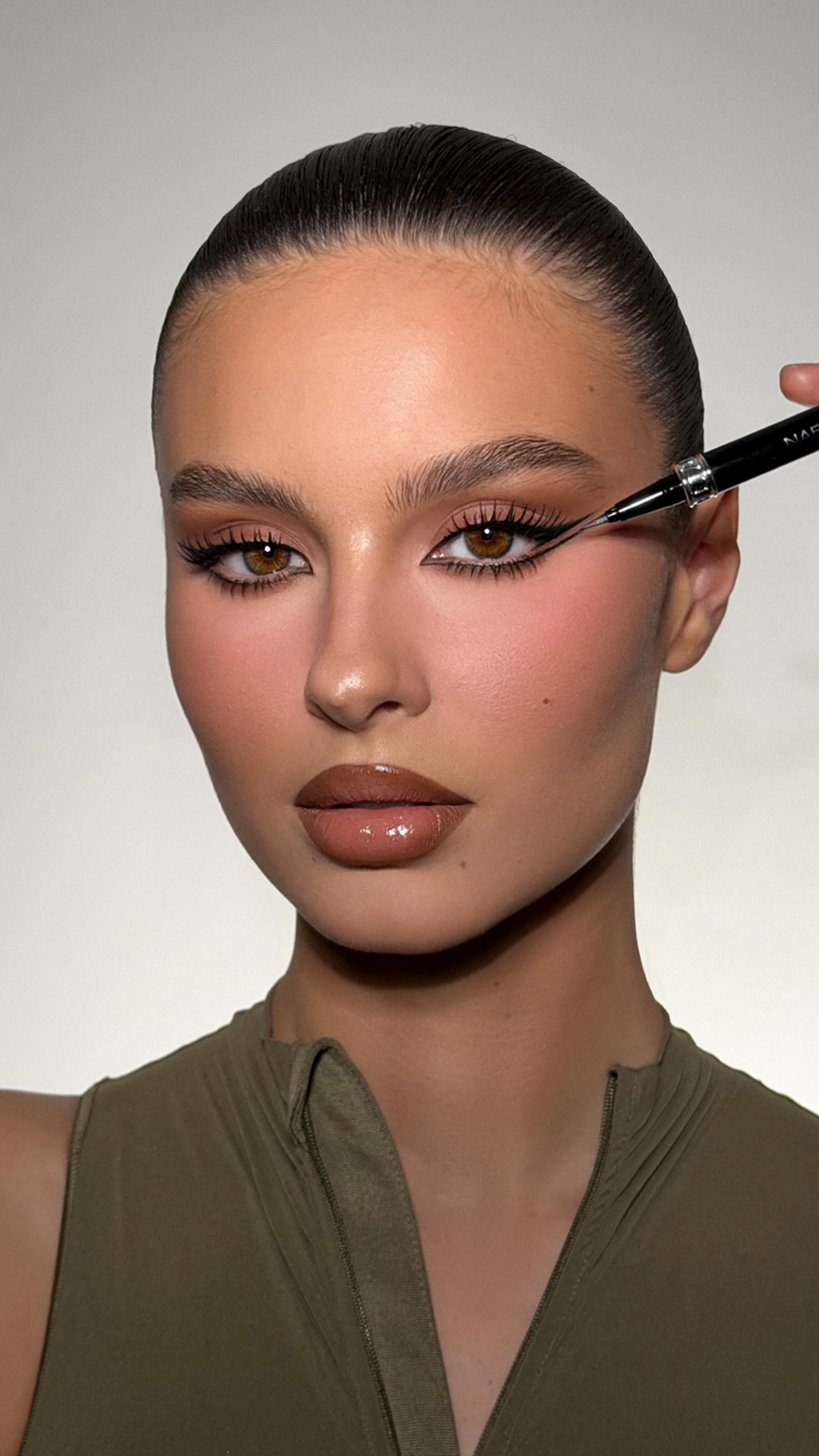 Instagram post by @mrdanielmakeup for NABLA Cosmetics. Caption reads: Double Graphic Liner Look using the NEW!! True....