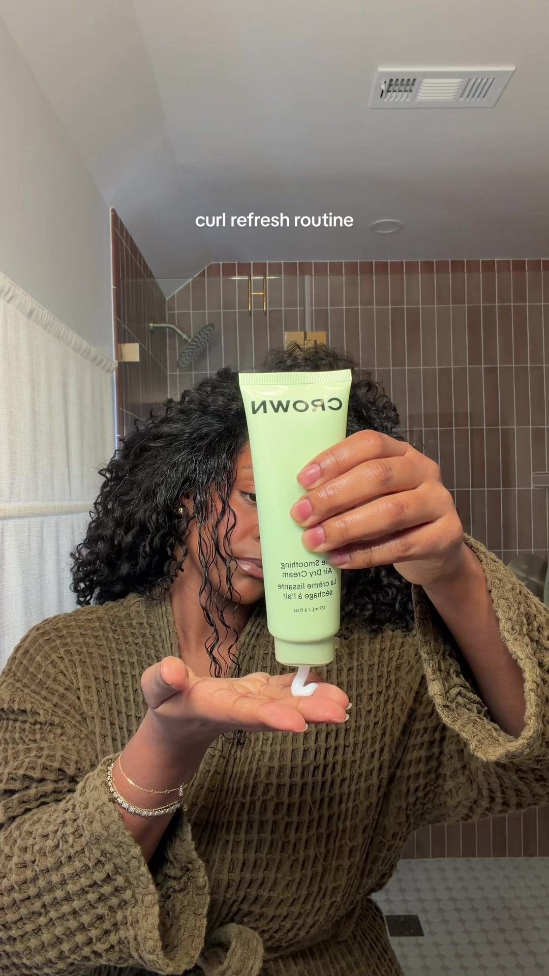 TikTok post by @hermela_solomon for Crown Affair. Caption reads: [...] The Smoothing Air Dry Cream from @Crown....