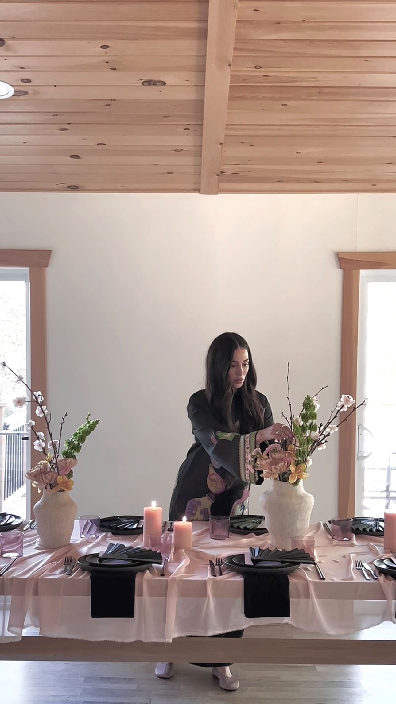 Instagram post by @natashalao for Apartment Therapy. Caption reads: 🌸A dinner party inspired by cherry blossom....