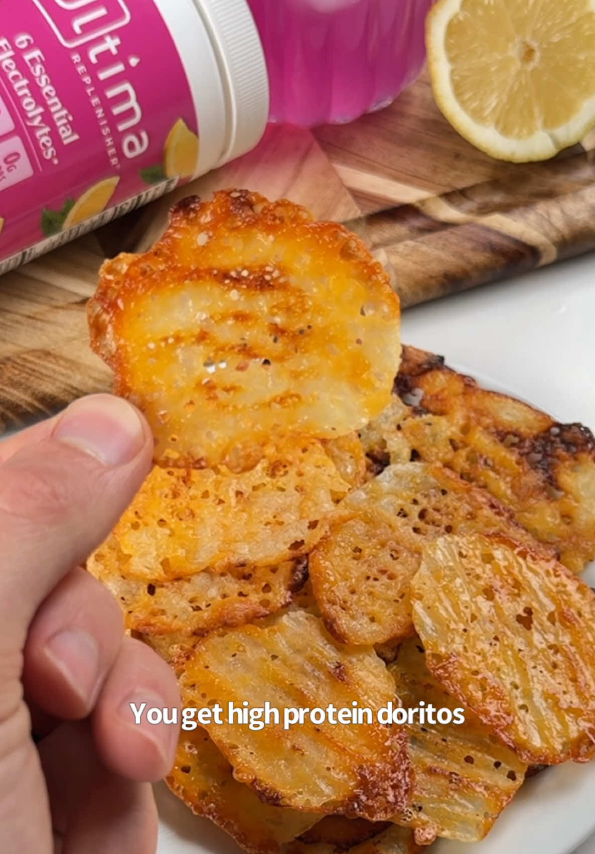 TikTok post by @iricksnacks for Ultima Replenisher. Caption reads: [...] these Cottage Cheese Chips with @Ultima....