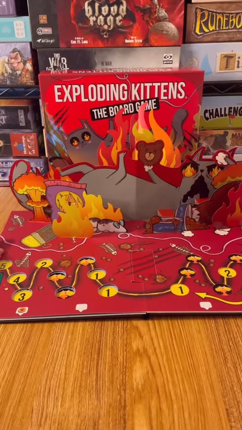Instagram post by @tiktokboardgames for Exploding Kittens. Caption reads: [...] changes as you play! 🤯💣🐱 Exploding....