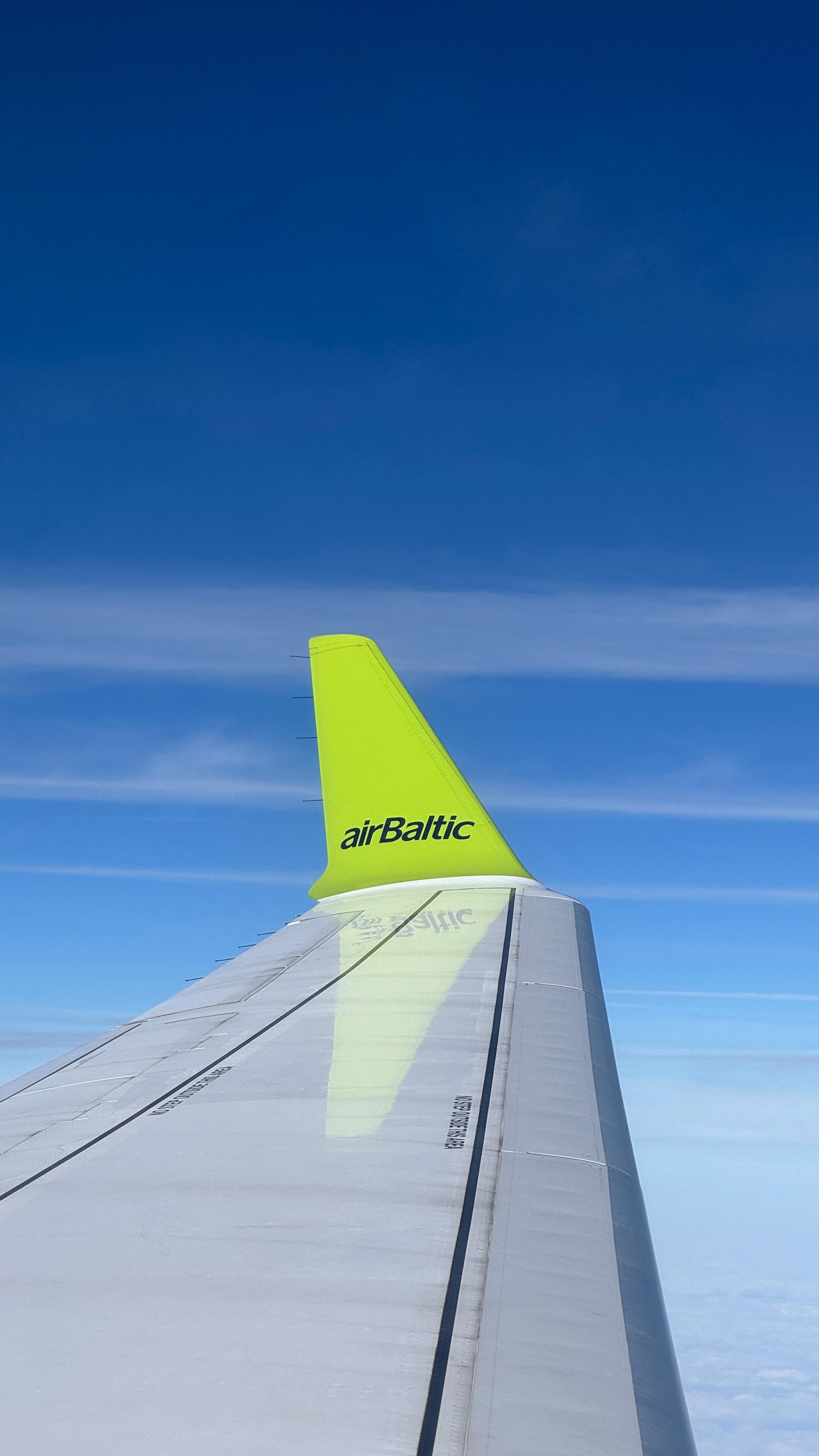 Instagram post by @travelmorewithsimon for airBaltic. Caption reads: #ad | Have you ever visited Tallinn? 🇪🇪

In....