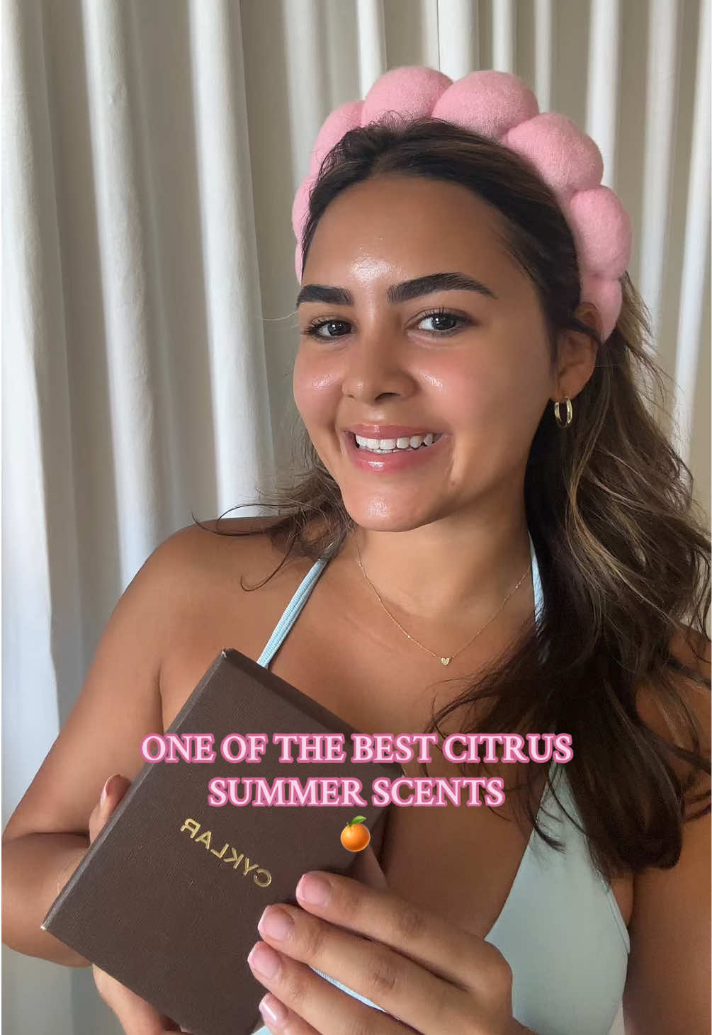TikTok post by @tabitha_gonzalez for CYKLAR. Caption reads: Obsessed with Naked Neroli 🍊@CYKLAR....