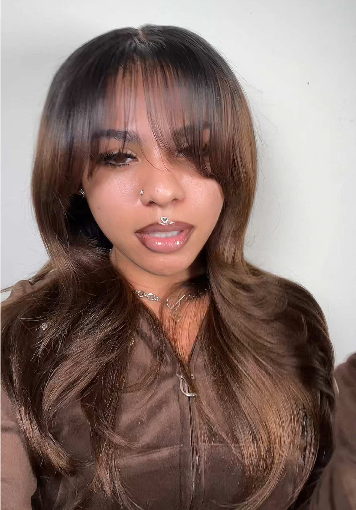 TikTok post by an influencer for Curlyme. Caption reads: [...] In Bio🤎20” 7x5 Glueless From @CurlyMe Hair....