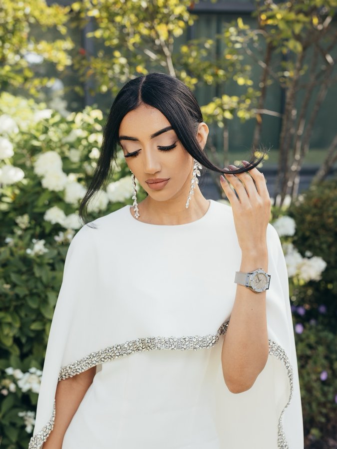 Instagram post by @tamkaur for Hublot. Caption reads: Sleek in Essential Taupe @hublot.