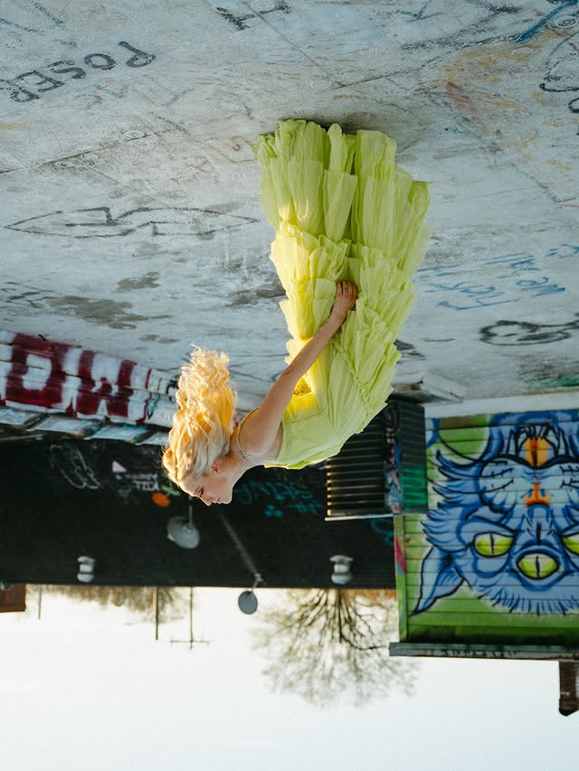 Instagram post by @alexisreneee__ for Nuuly. Caption reads: The world shifted.. 💚‼️✨💅🏻

Absolutely slayed....