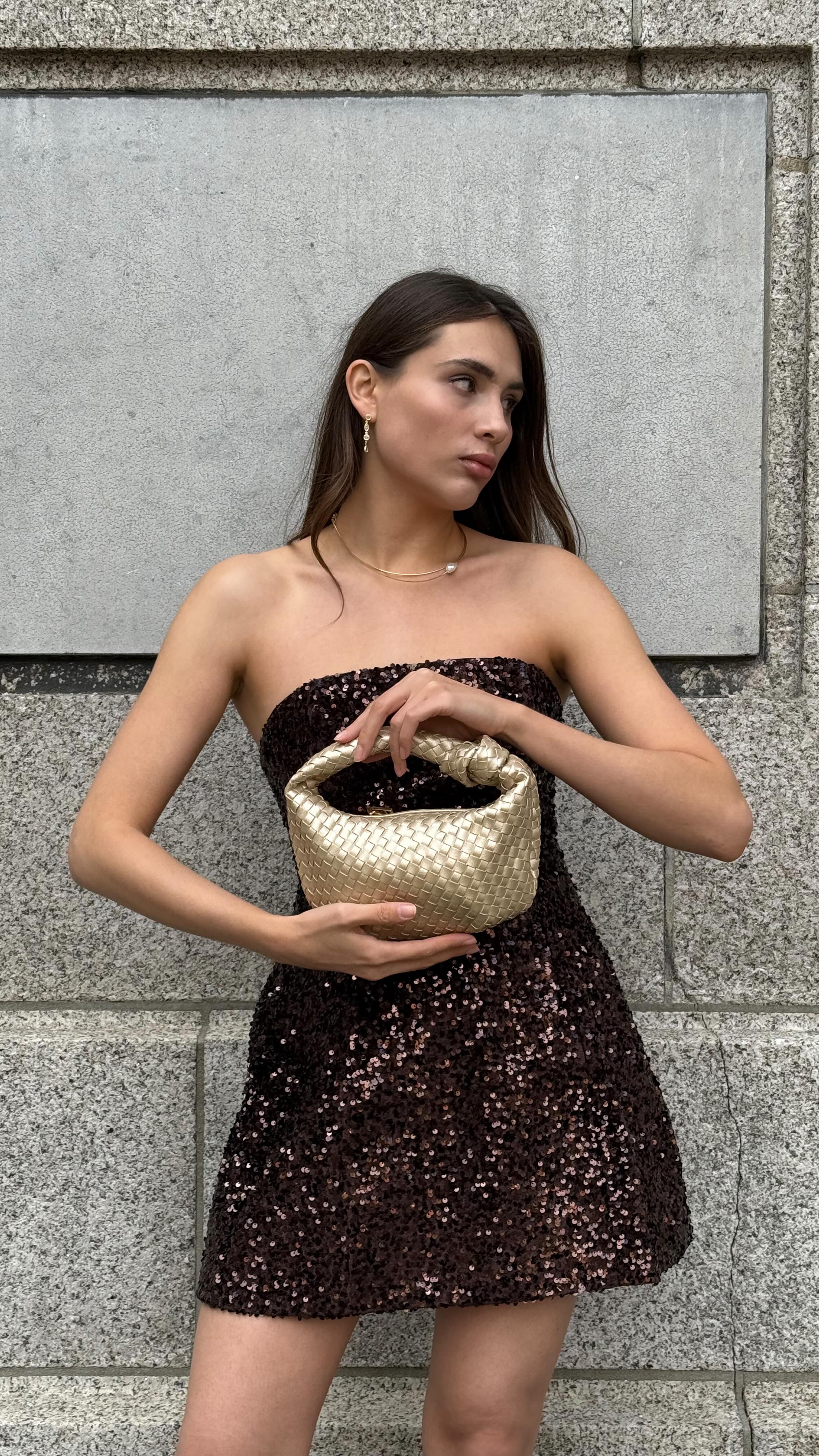 Instagram post by @katyaklema for Anthropologie. Caption reads: chronically late but stylishly consistent....