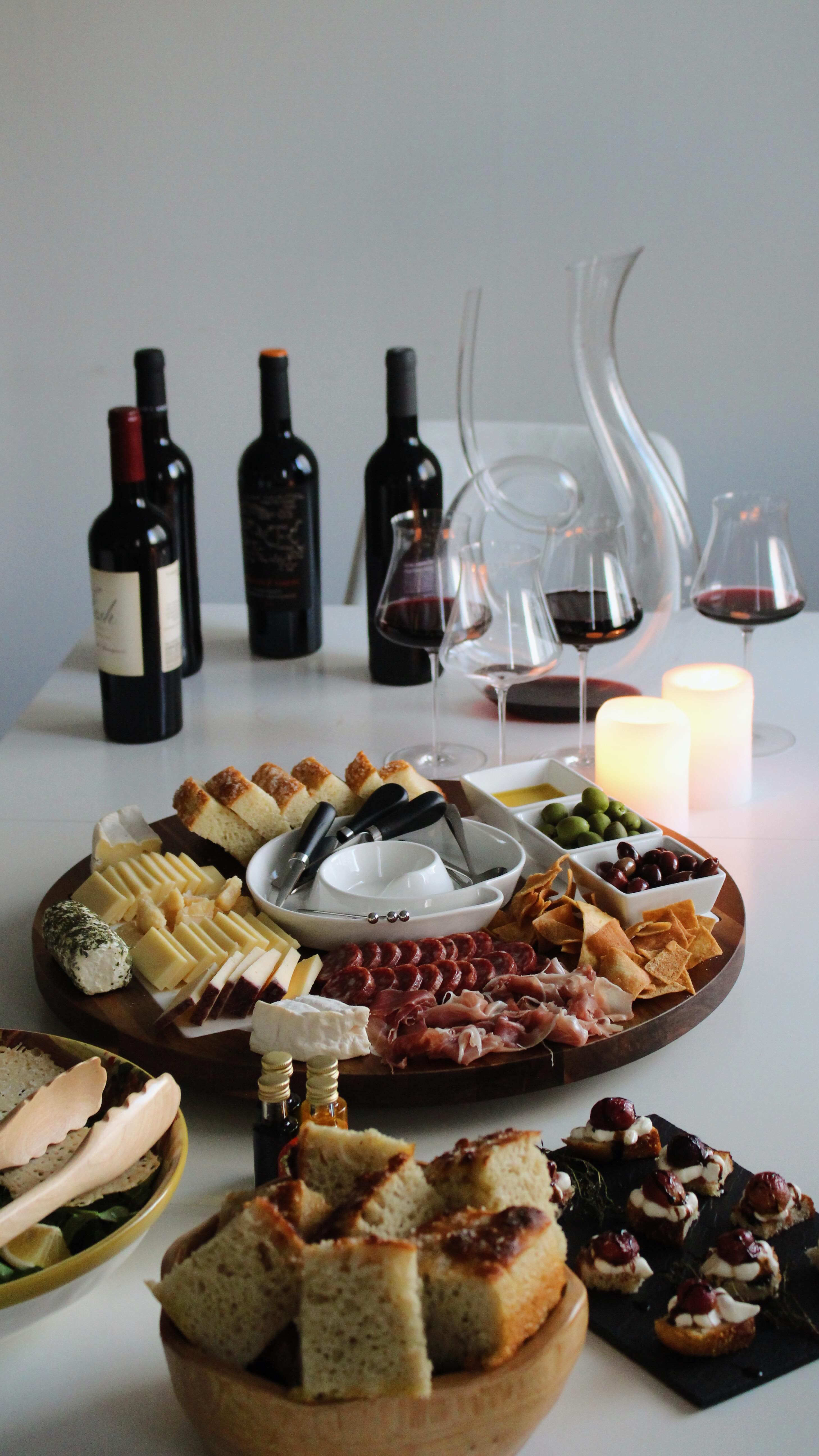 Instagram post by @kaitsplatess for WineEnthusiast. Caption reads: wine night essentials 🍷✨ #ad the @wineenthusiast....