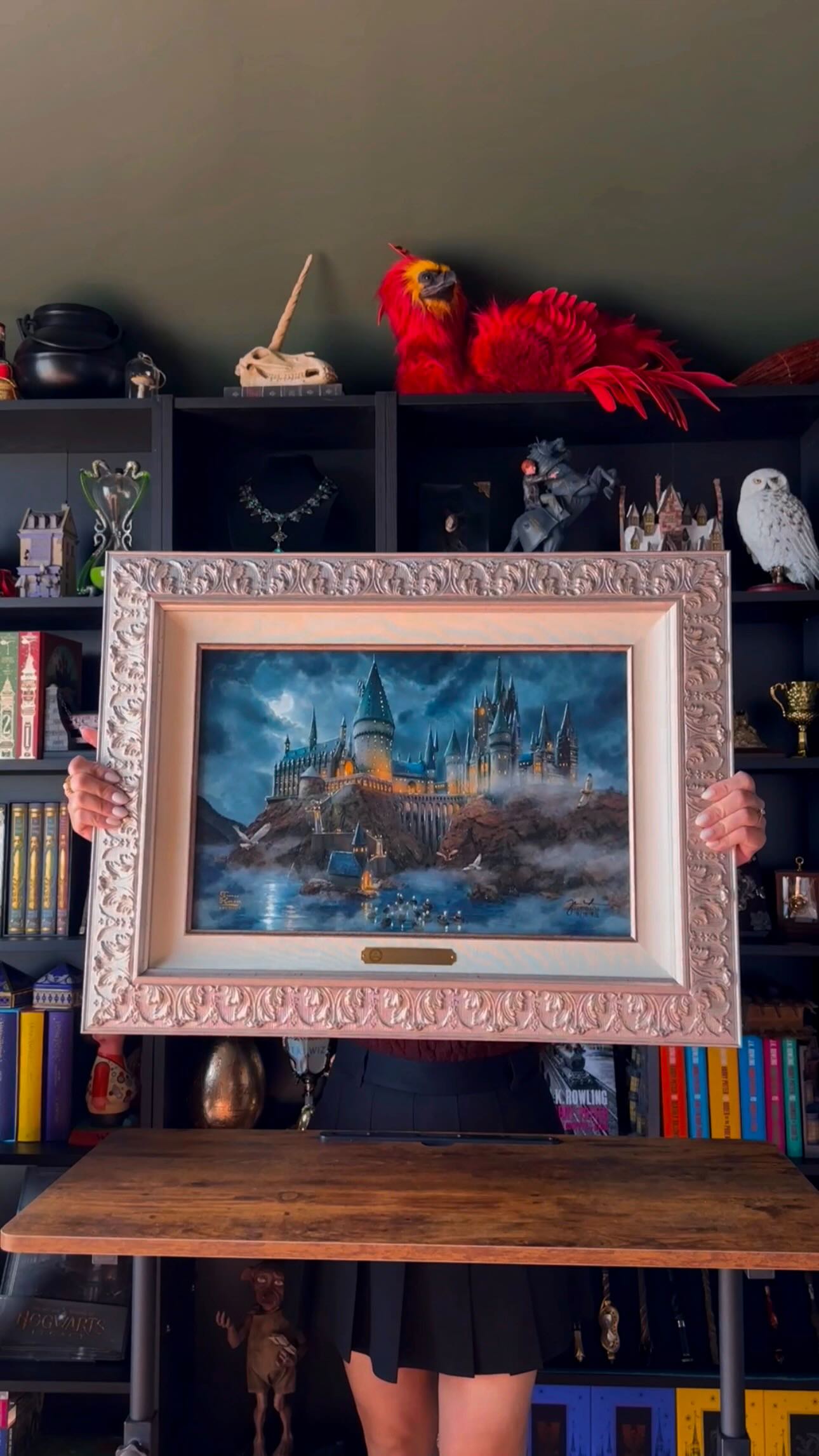 Instagram post by @thewizardingsibs for Thomas Kinkade Studios. Caption reads: ✨GIVEAWAY:Thomas Kinkade Studios x Harry Potter....