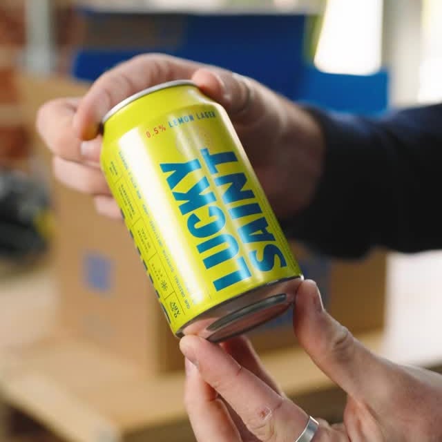 Instagram post by @jackmeach for Lucky Saint. Caption reads: Starting the weekend with the new @luckysaintbeer....