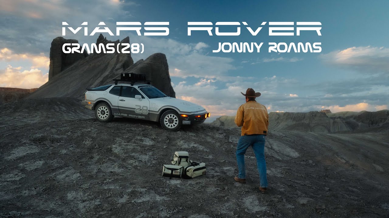YouTube post by @JonnyRoams for GRAMS28. Caption reads: Safari Porsche 944 x Grams28 Cinematic Short Film....