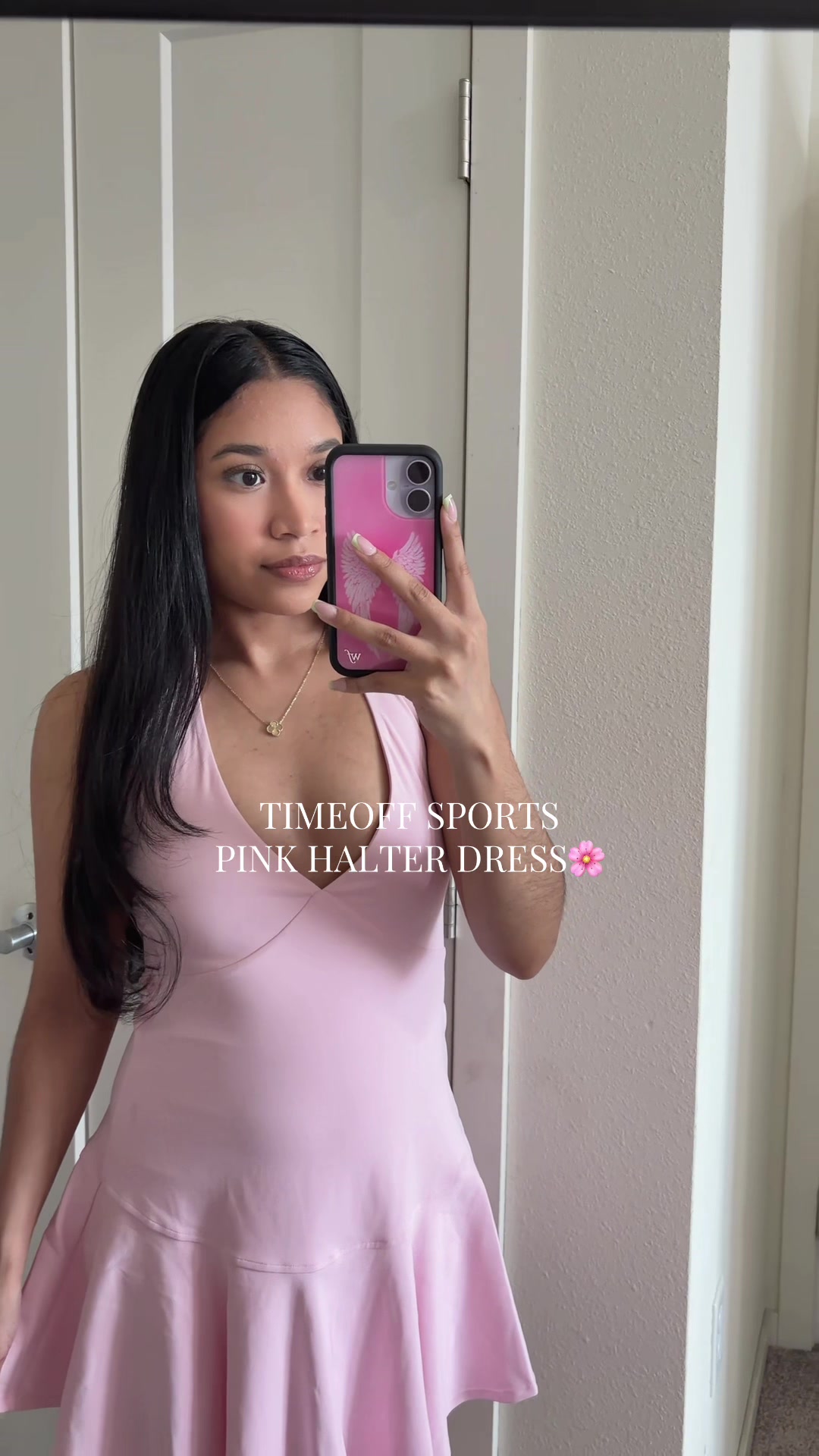 TikTok post by @andrea.alv_ for TimeOFF Sports. Caption reads: Pink halter dress🌸 @TimeOFF Sports #halterdress....