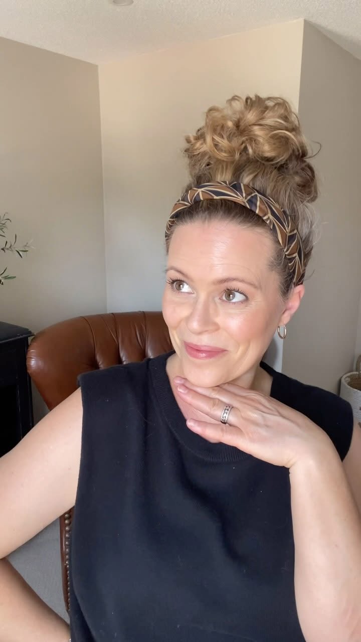 Instagram post by @me.and.my.curls for Banana Republic Factory. Caption reads: I have been living in a topknot updo most of this....