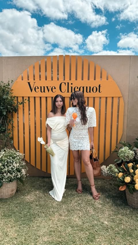 Instagram post by @amber_peebles for Veuve Clicquot. Caption reads: [...] had a magic afternoon trackside with....