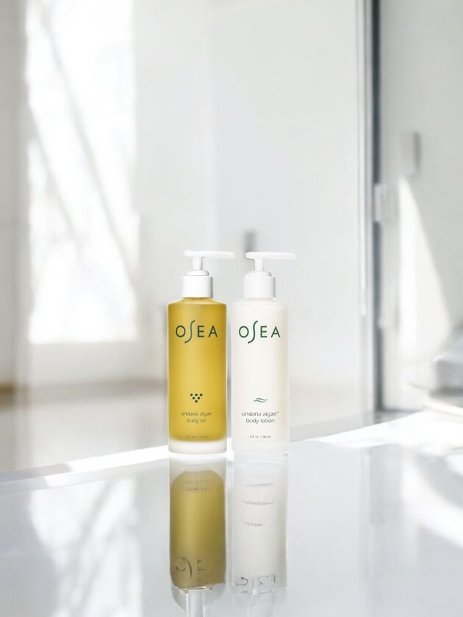 Instagram post by @glowdaily__ for OSEA Malibu. Caption reads: 🌊 FREE Gift with Purchase Event is now live–....