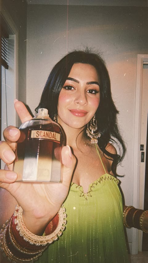 Instagram post by @_ritzyy_ for Jean Paul Gaultier. Caption reads: [...] Jean Paul Scandal Elixir perfume....