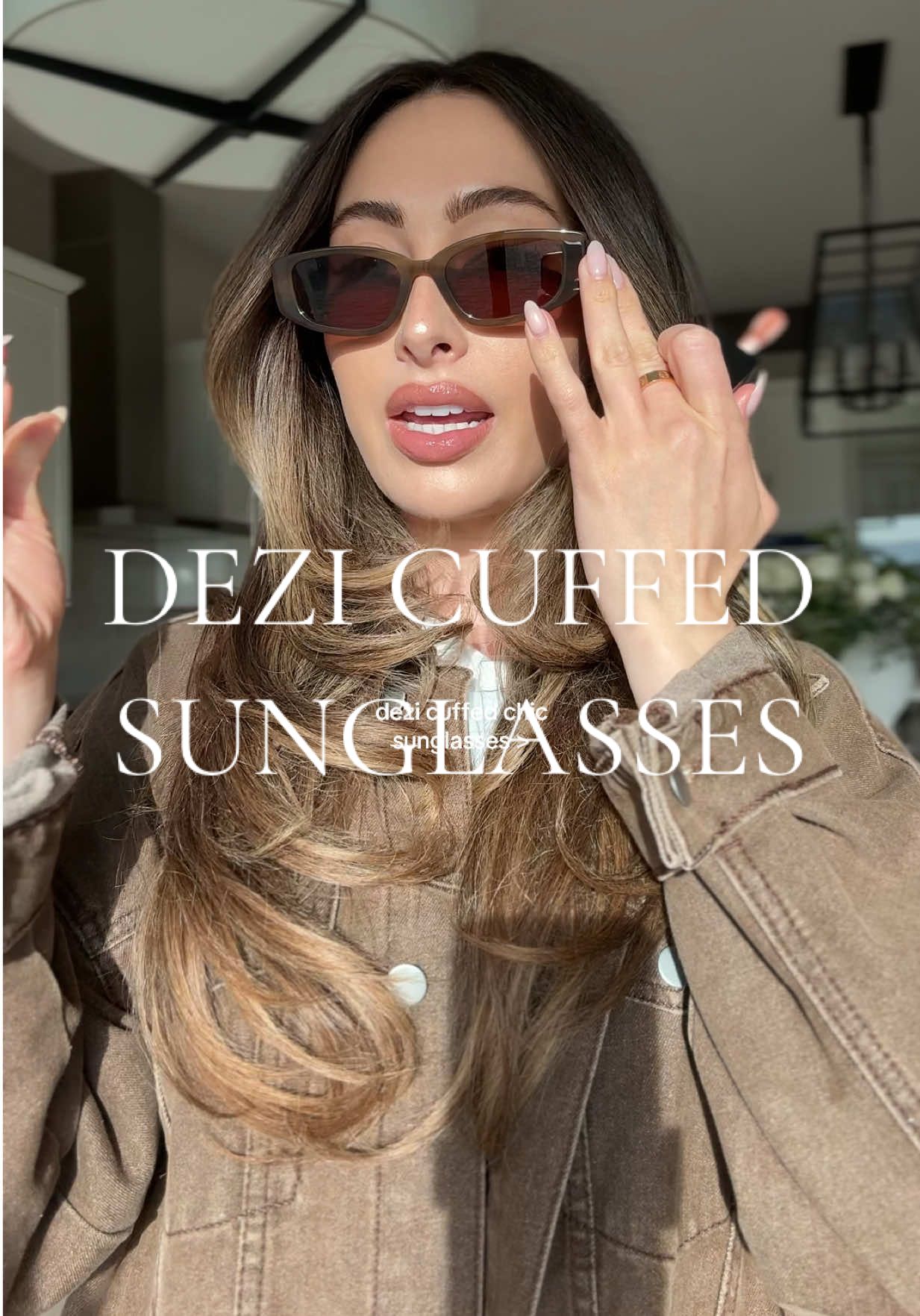 TikTok post by @briannametzger1 for DEZI. Caption reads: They look good on any face shape #dezi #eyewear....