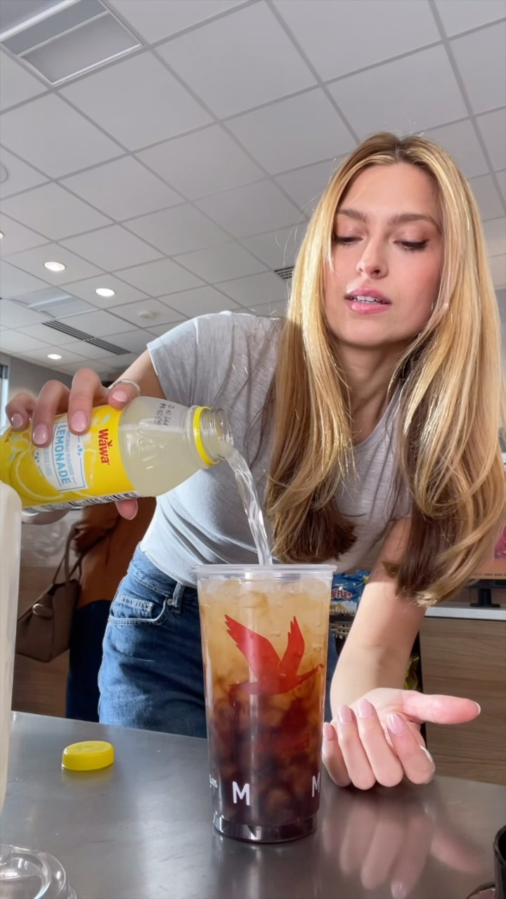 Instagram post by @cash.rina for WAWA. Caption reads: Is this lemon cream latte at Wawa the drink of....