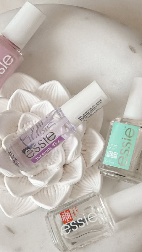 Instagram post by @kate_romanoff for essie. Caption reads: [...] been testing this new liquid patch from....