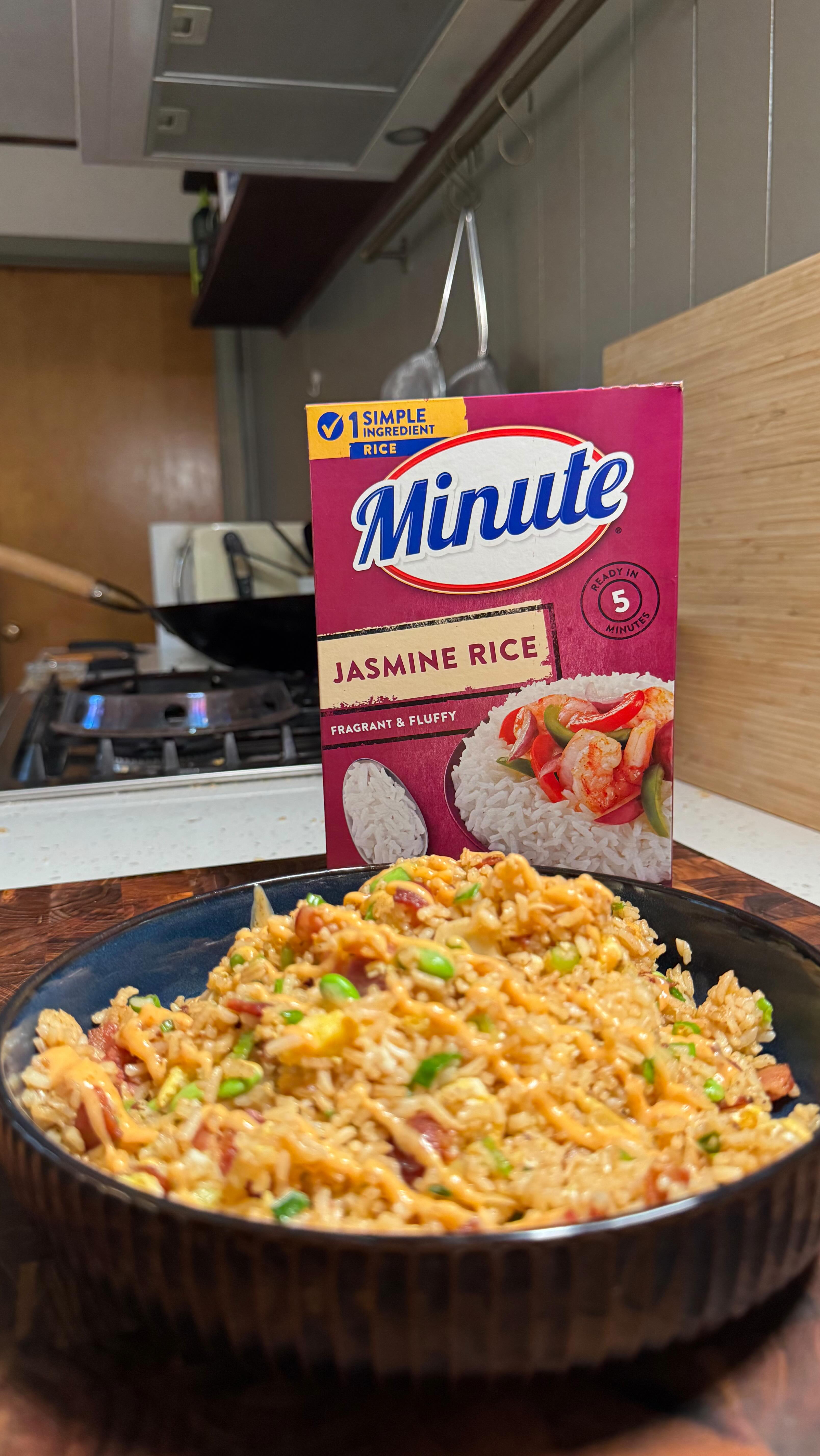 Instagram post by @mr.hollmilkeats for Minute Rice. Caption reads: Quick Gochujang Fried Rice with @minutericeus....