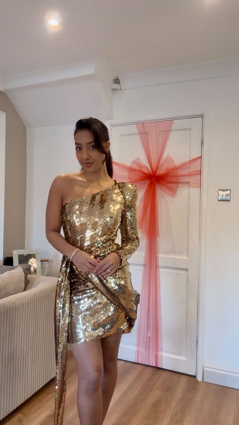 Instagram post by @sanamiee for Kurt Geiger. Caption reads: Christmas party outfit Inspo ✨🎄 

Dress....