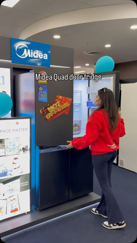 Instagram post by @xbina1 for Midea. Caption reads: Meet the New Midea Space Master Quad Door Fridge.....
